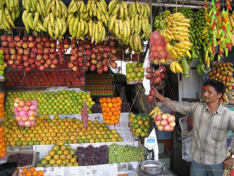 Kottayam fruit market man apple orange banana grape