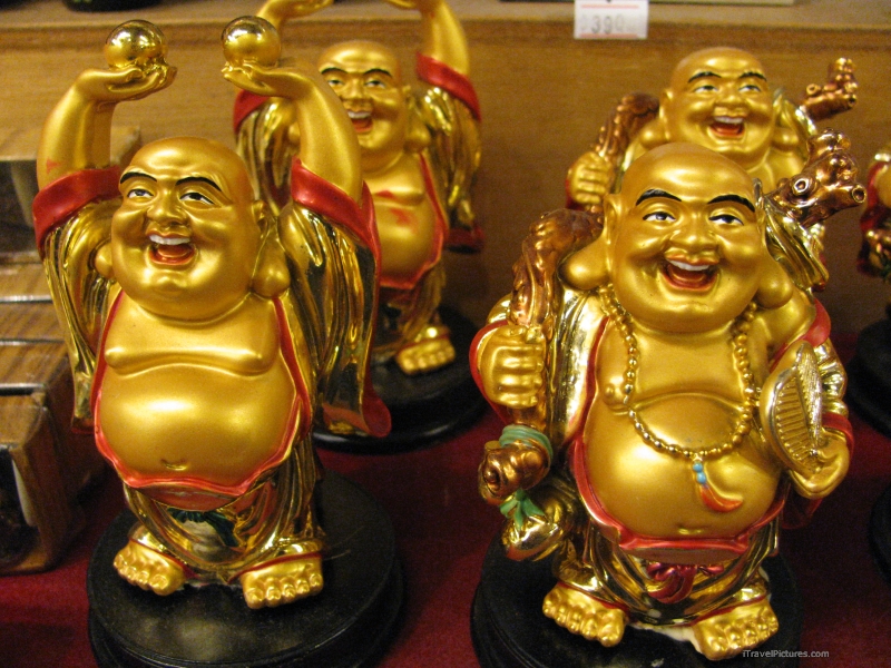 tatue statues golden laughing