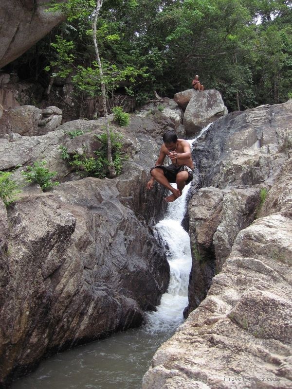 Than Prawet Man jumping waterfall