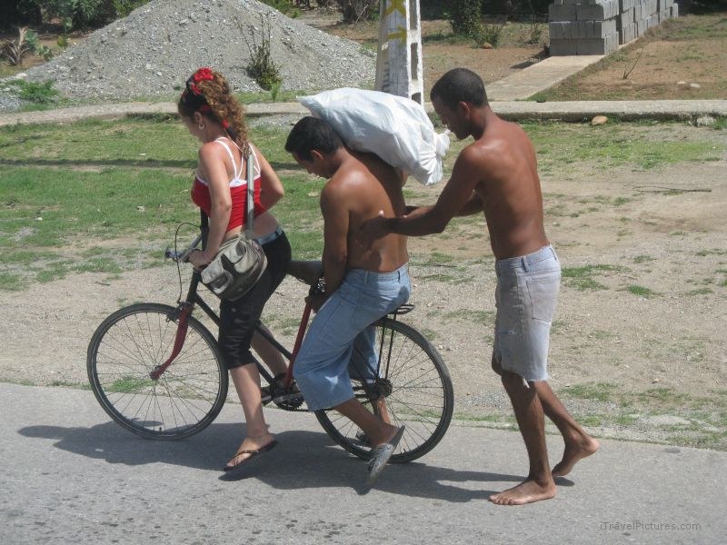 Baracoa bicycle man woman bicycle carrying