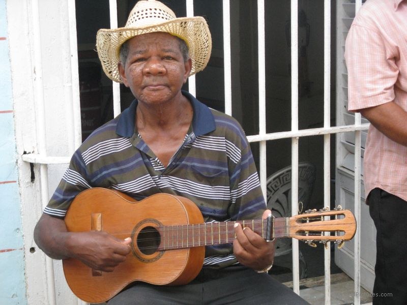 Trinidad musician music guitar hat