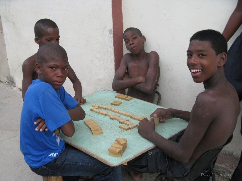 Matanzas teenagers playing dominoes boy boys domino smile smiling