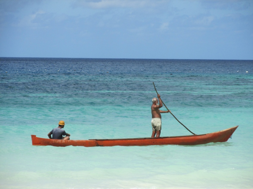 oat canoe fishermen blue water