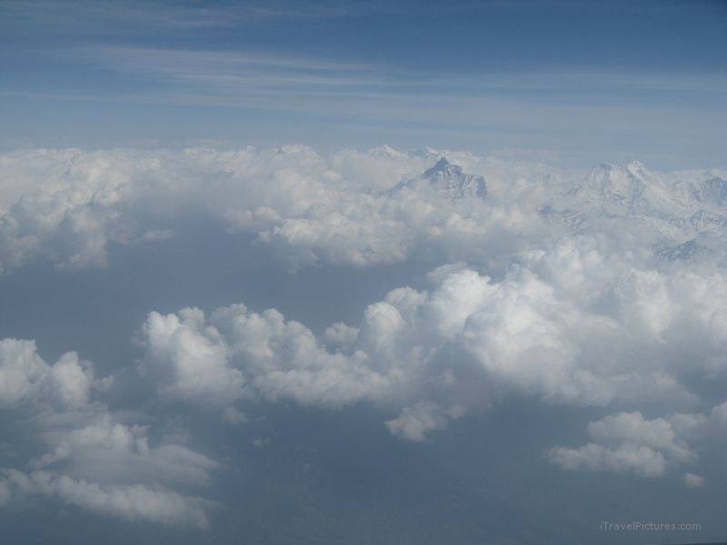 from plane aerial cloud clouds mountain mountains