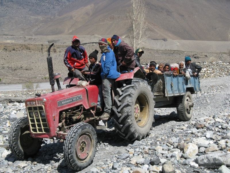 Jomsom trek tractor bus people