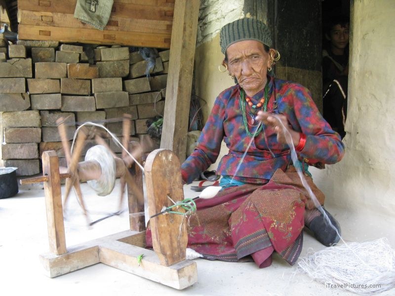 woman spinning wool