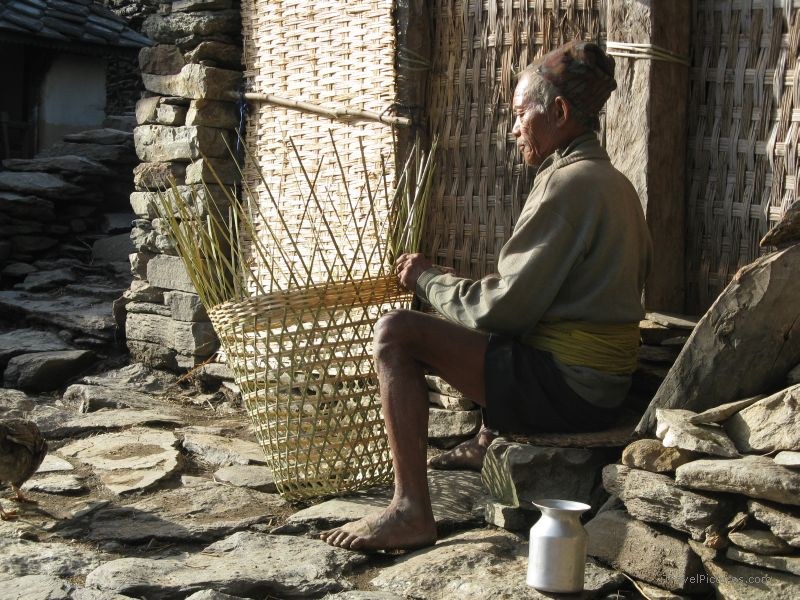 Chaliss man weaving basket