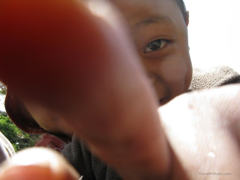 Chaliss boy curious camera finger