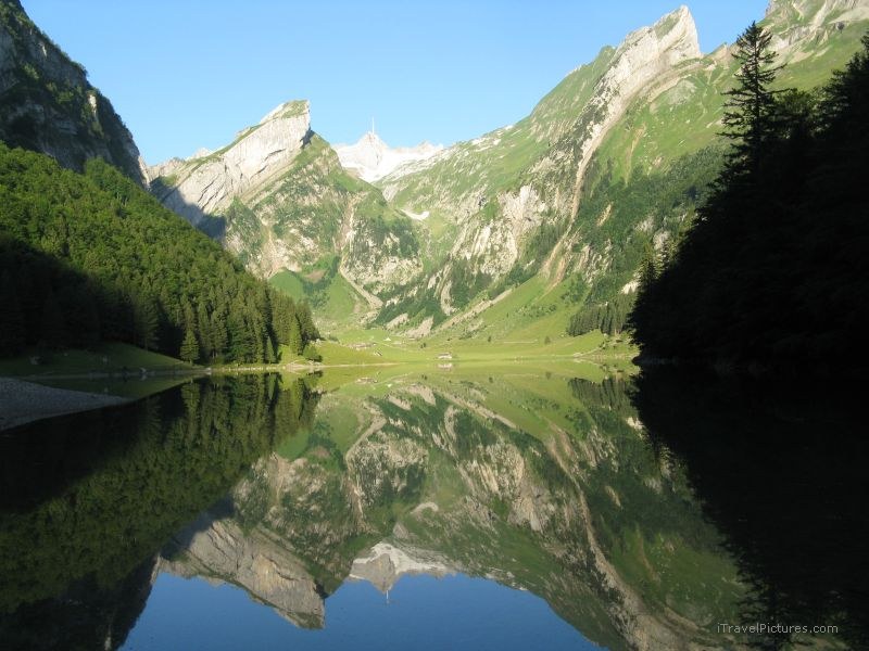 Seealpsee lake mountain reflection morning